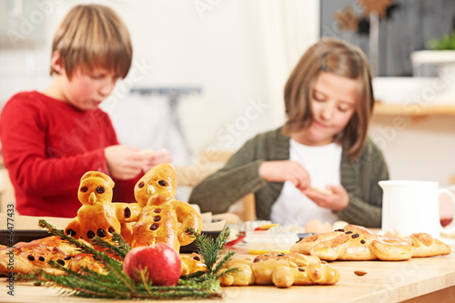 Photo: kids preparing a yeast dough kids preparing a yeast dough