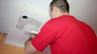 Video: Man Applaying Plaster on a Dry Wall Man Applaying Plaster on a Dry Wall