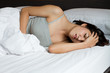 sick woman in bedroom