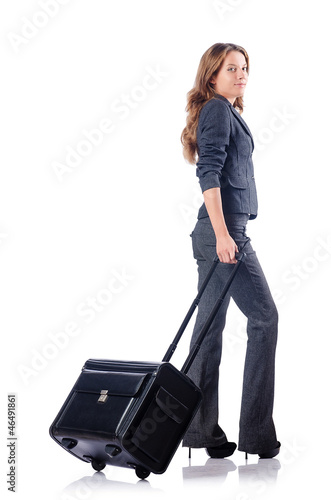 Photo: Businesswoman with suitcase on white Businesswoman with suitcase on white