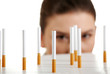 Young woman looking on cigarettes