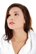 Young beautiful woman in bathrobe