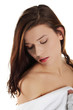 Young beautiful woman in bathrobe