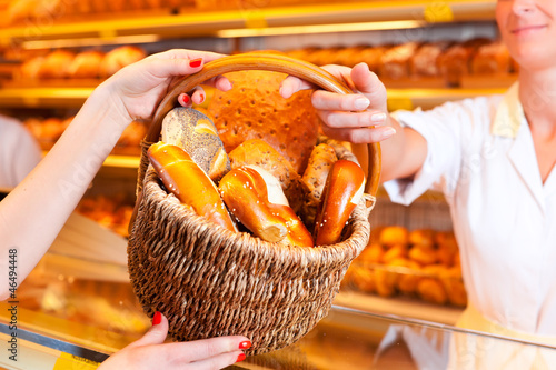 Photo: Salesperson with female customer in bakery Salesperson with female customer in bakery