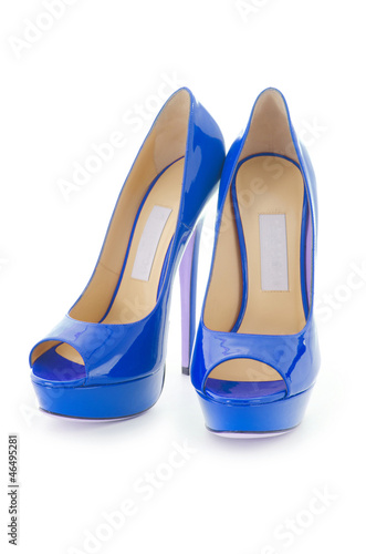 Photo: Woman shoes isolated on white Woman shoes isolated on white