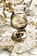 Old fashioned earth glass globe on the vintage map