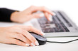 Hands working on the keyboard