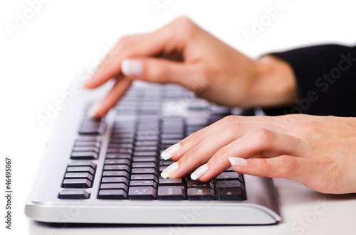 Photo: Hands working on the keyboard Hands working on the keyboard
