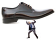 Woman domination concept with shoes and man