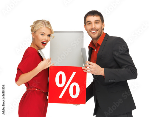 Photo: man and woman with percent sign man and woman with percent sign