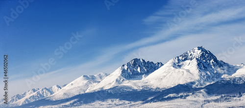 Photo: Dramatic peaks pinnacles snowy summits high altitude mountain pa Dramatic peaks pinnacles snowy summits high altitude mountain pa