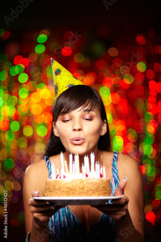 Photo: Blowing on candles Blowing on candles