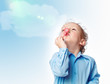 Photo: Boy blowing a bubble Boy blowing a bubble