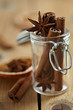 Cinnamon sticks and anise stars in glass jar