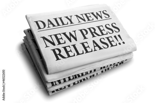 Photo: New press release daily newspaper headline New press release daily newspaper headline