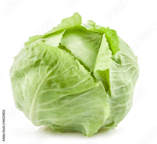 Photo: Green cabbage isolated on white Green cabbage isolated on white