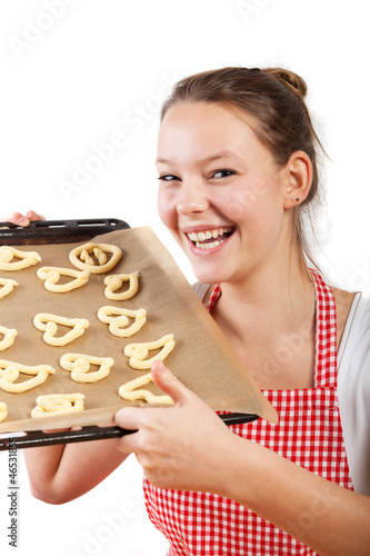 Photo: Frau beim Backen von Weihnachtsplätzchen Frau beim Backen von Weihnachtsplätzchen