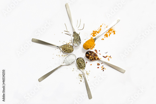 Photo: Spices and herbs on white background Spices and herbs on white background