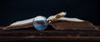 magnifing glass and old book
