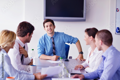 Photo: business people in a meeting at office business people in a meeting at office