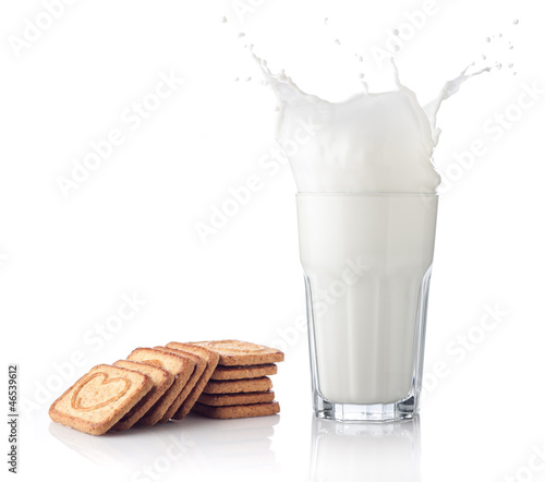 Photo: Splash of milk with various grain biscuits Splash of milk with various grain biscuits