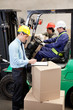 Photo: Supervisor With Foremen Working At Warehouse Supervisor With Foremen Working At Warehouse