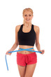 Young woman measuring perfect shape of her body
