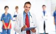 Smiling doctor in front of his team