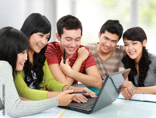 Photo: Group of young student with laptop Group of young student with laptop