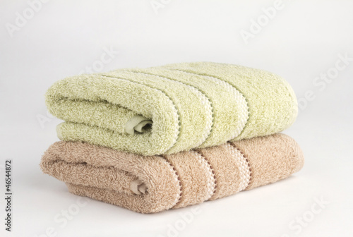 Photo: stack of two towels on white background stack of two towels on white background