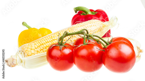 Photo: pepper, ripe yellow corn and tomato pepper, ripe yellow corn and tomato