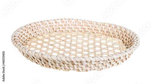Photo: Wickerwork empty yellow breadbasket on white background Wickerwork empty yellow breadbasket on white background