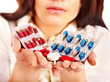 Woman having pills and tablets.