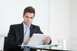 Young Businessman With Digital Tablet And Coffee Cup