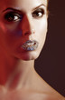 Luxury woman with rhinestones on her lips