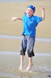 Boy running on the beach