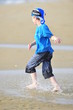 Boy running on the beach