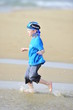 Boy running on the beach