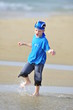 Boy running on the beach