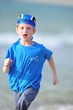 Boy running on the beach