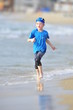 Boy running on the beach