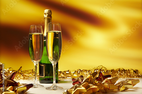 Photo: Champagne glasses on celebration table Champagne glasses on celebration table