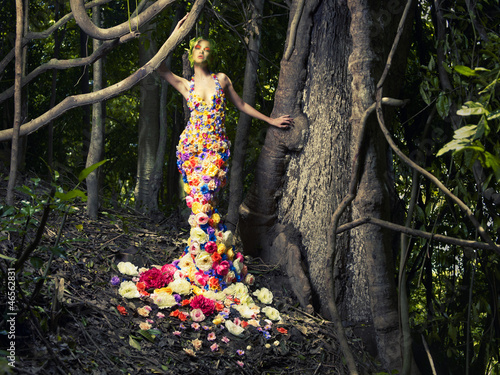 Photo: Beautiful lady in dress of flowers Beautiful lady in dress of flowers