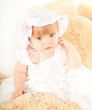 Photo: studio shot of blond little baby girl studio shot of blond little baby girl
