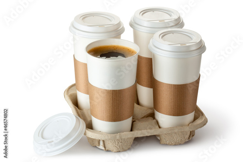 Photo: Four take-out coffee in holder. One cup is opened. Four take-out coffee in holder. One cup is opened.