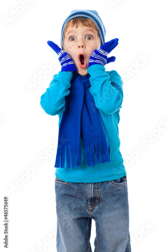 Photo: Amazed boy in winter clothes Amazed boy in winter clothes