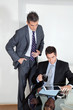 Businessman With Digital Tablet In A Meeting With Colleague