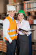Photo: Two Young Supervisors At Warehouse Two Young Supervisors At Warehouse