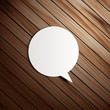 Vector wooden background with speech bubbles paper stick