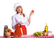 Photo: female chef holding a bell pepper in hand female chef holding a bell pepper in hand